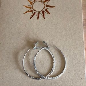 Silver hammered metal hoop earrings